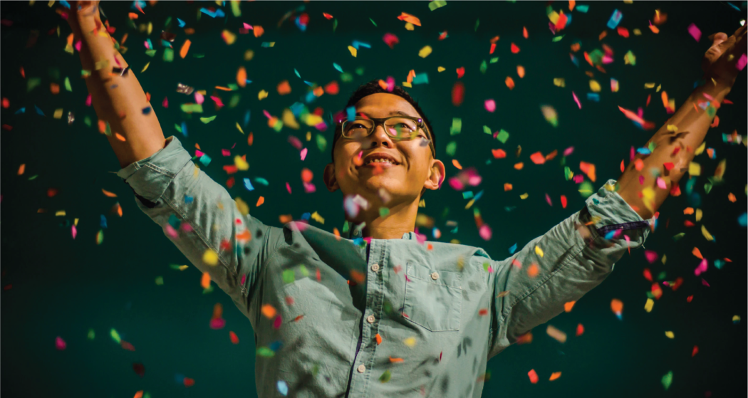 Image showcasing a man celebrating his achievements