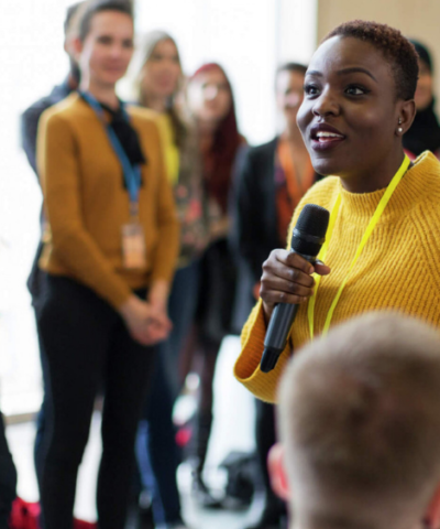 person facilitating group session