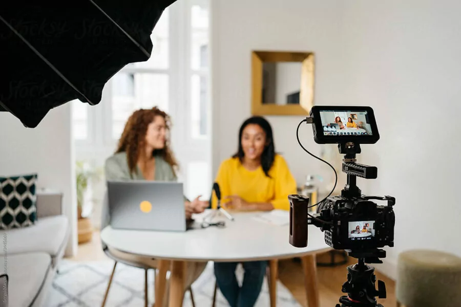 Ethnic women recording a podcast