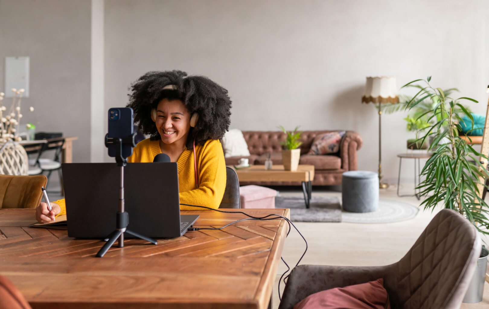 Woman Podcaster working from home.