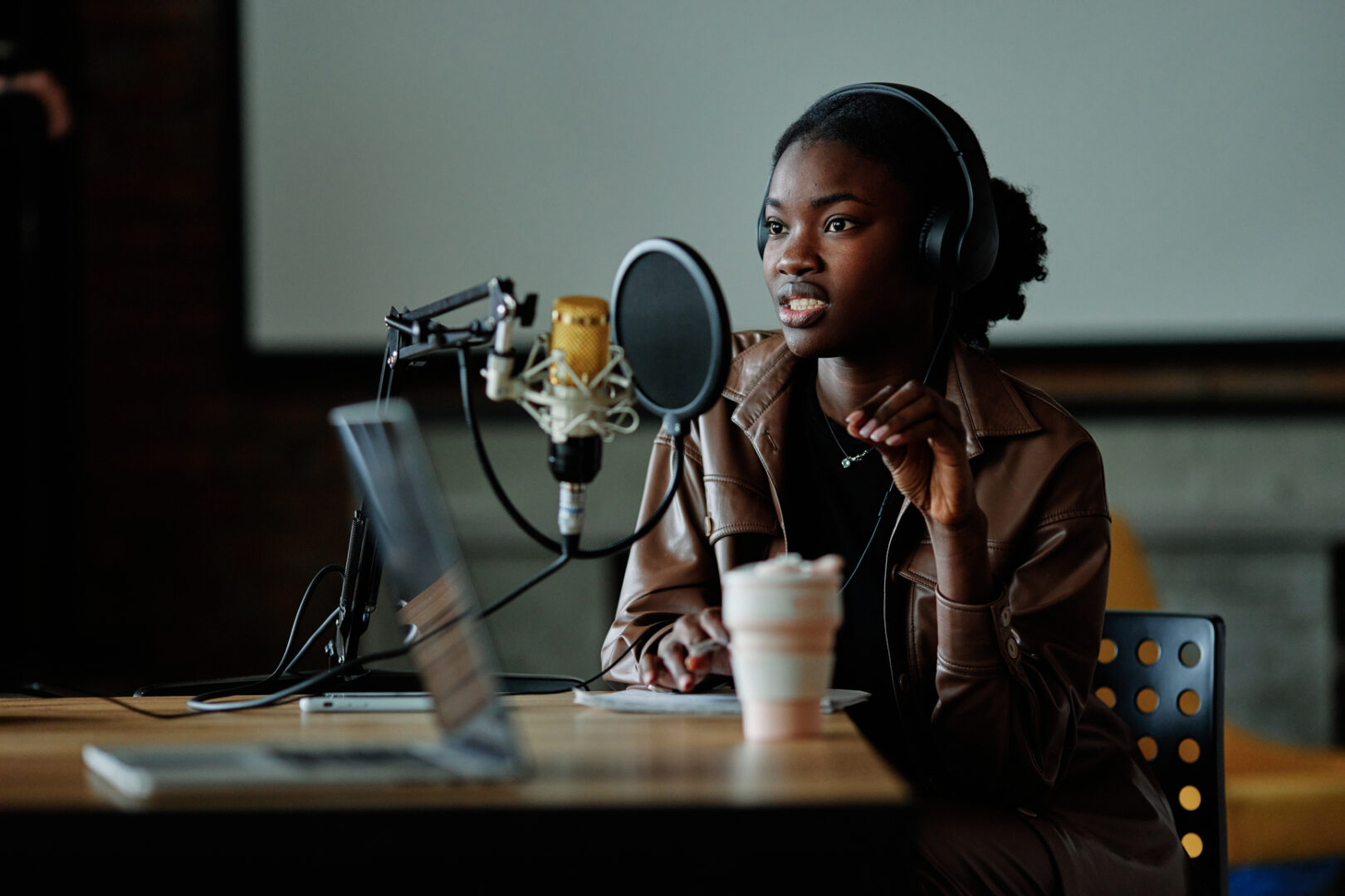 Woman recording a podcast