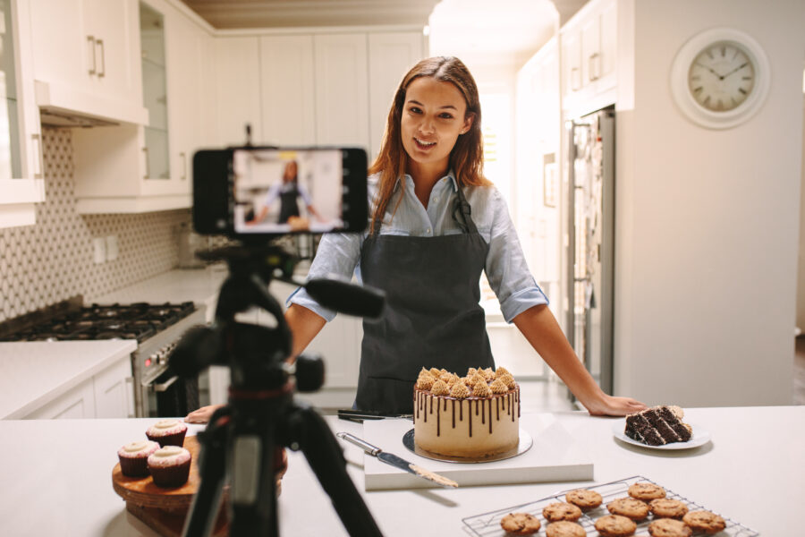 creator filming video content of her baking