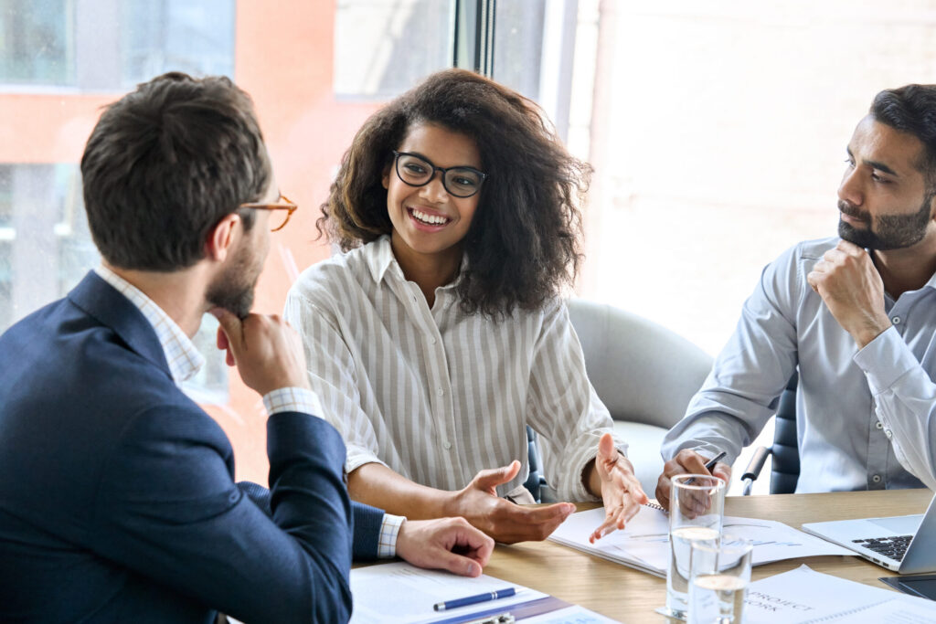 team at a table meeting 