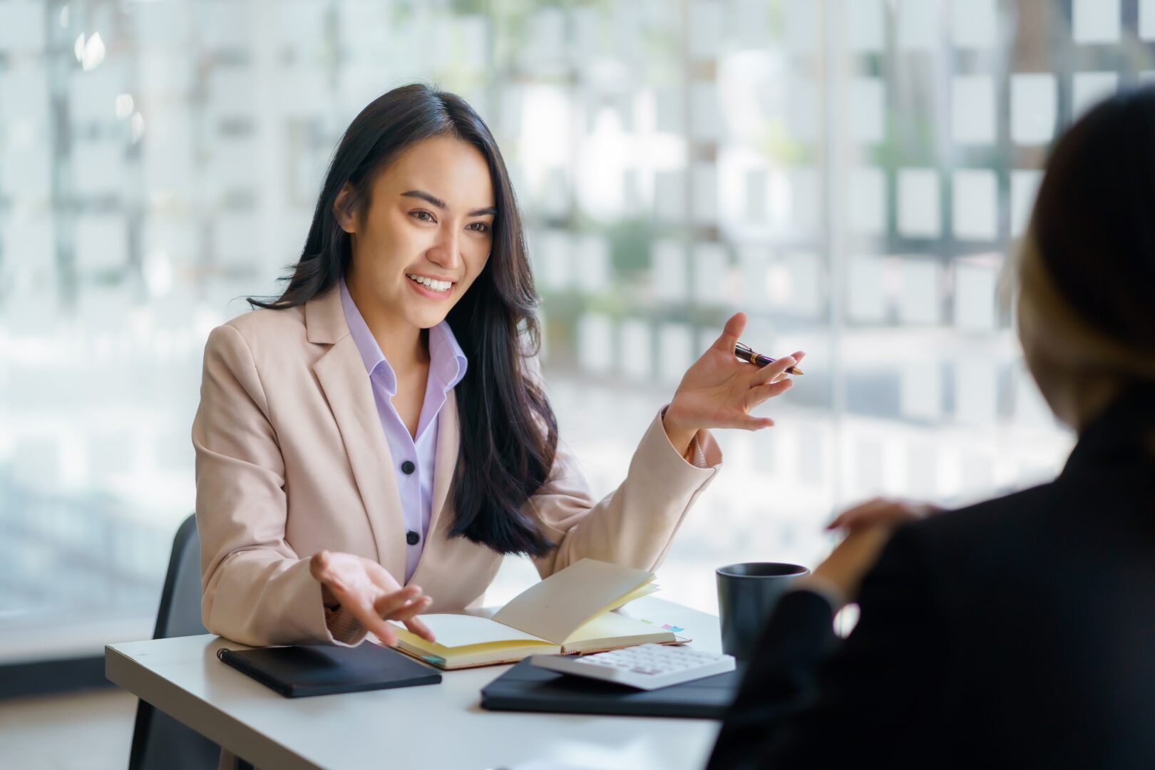 Woman giving business advice to client