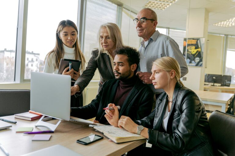 Team calculating LMS pricing